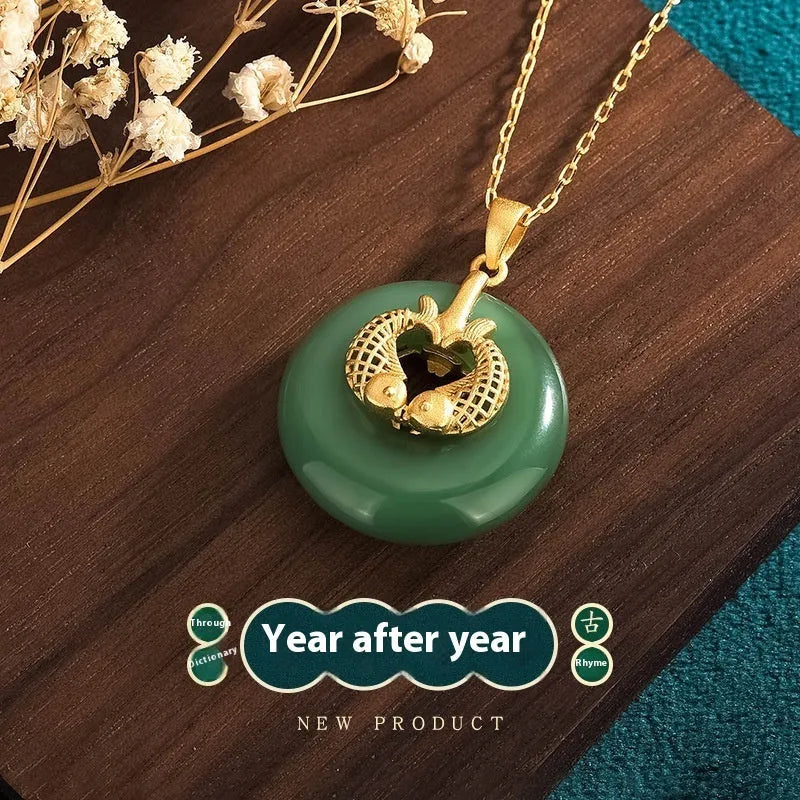 Gold koi animal zodiac necklace with green inlay pendant on adjustable chain