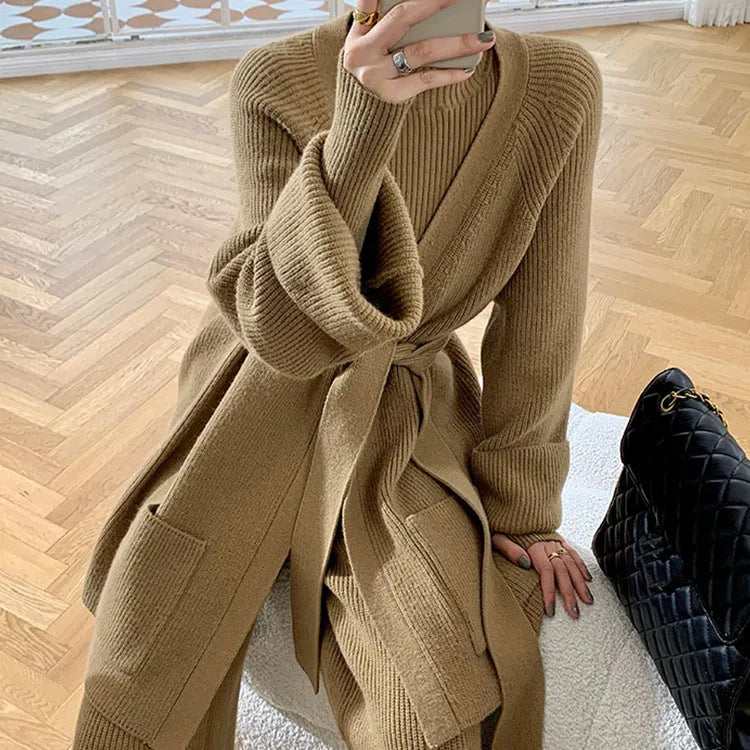 Women's apricot knitted three-piece set showing sweater, cardigan, and wide-leg pants with leather stitching detail