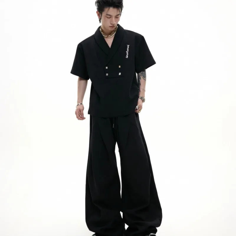 Men's dark grey cotton sports suit with V-neck jacket and matching shorts featuring metal embellishments