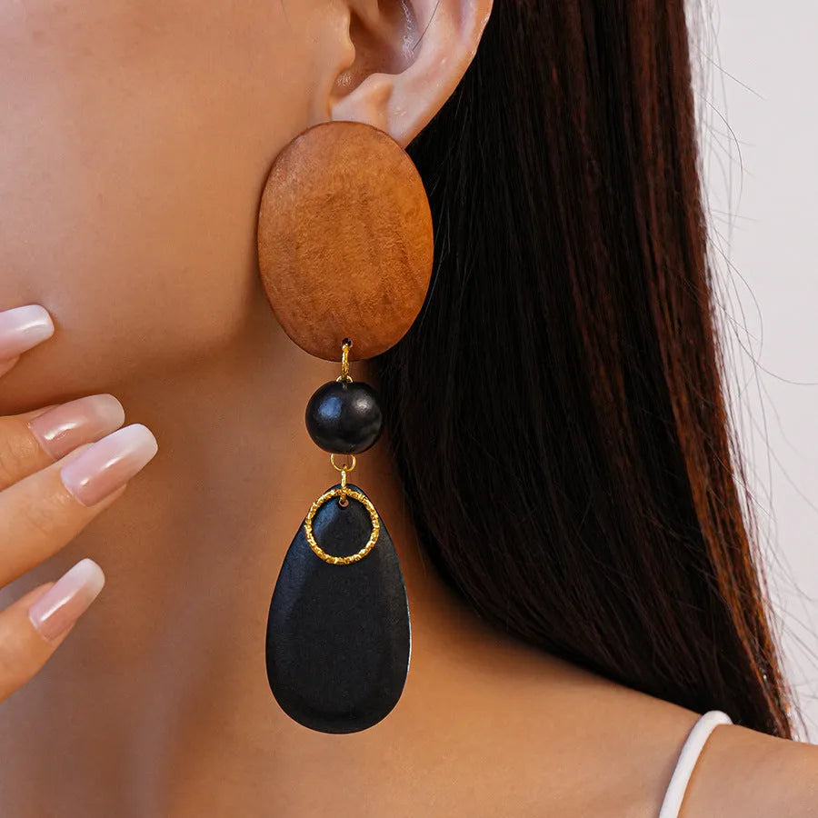 Pair of wooden retro-style ellipse earrings in silver needle-brown-black colour.