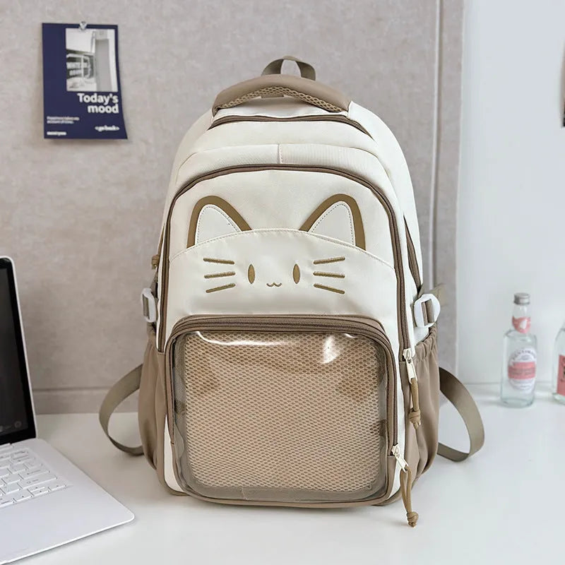 Korean cartoon pattern large backpack in multiple colours with curved straps and badge pendant option.