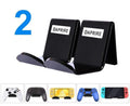 Universal game controller bracket accessory shown in black, white, and transparent colour options