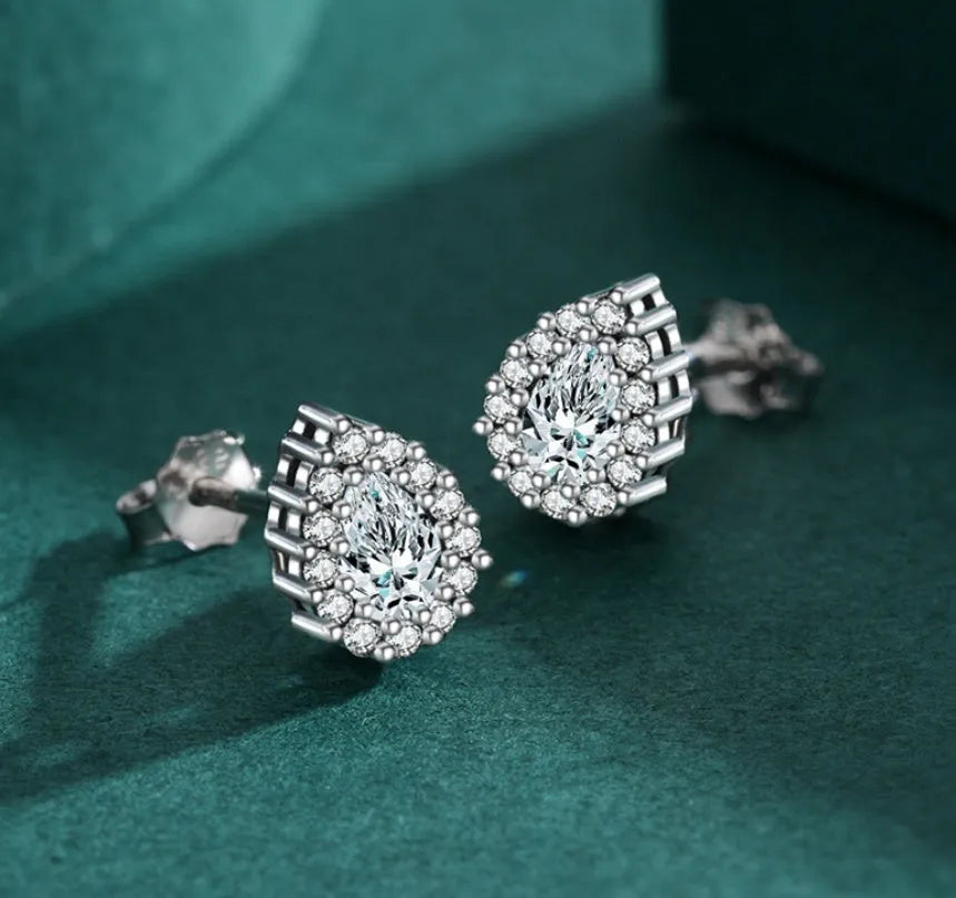 Silver water drop ear studs with geometric shape and diamond-cut surface