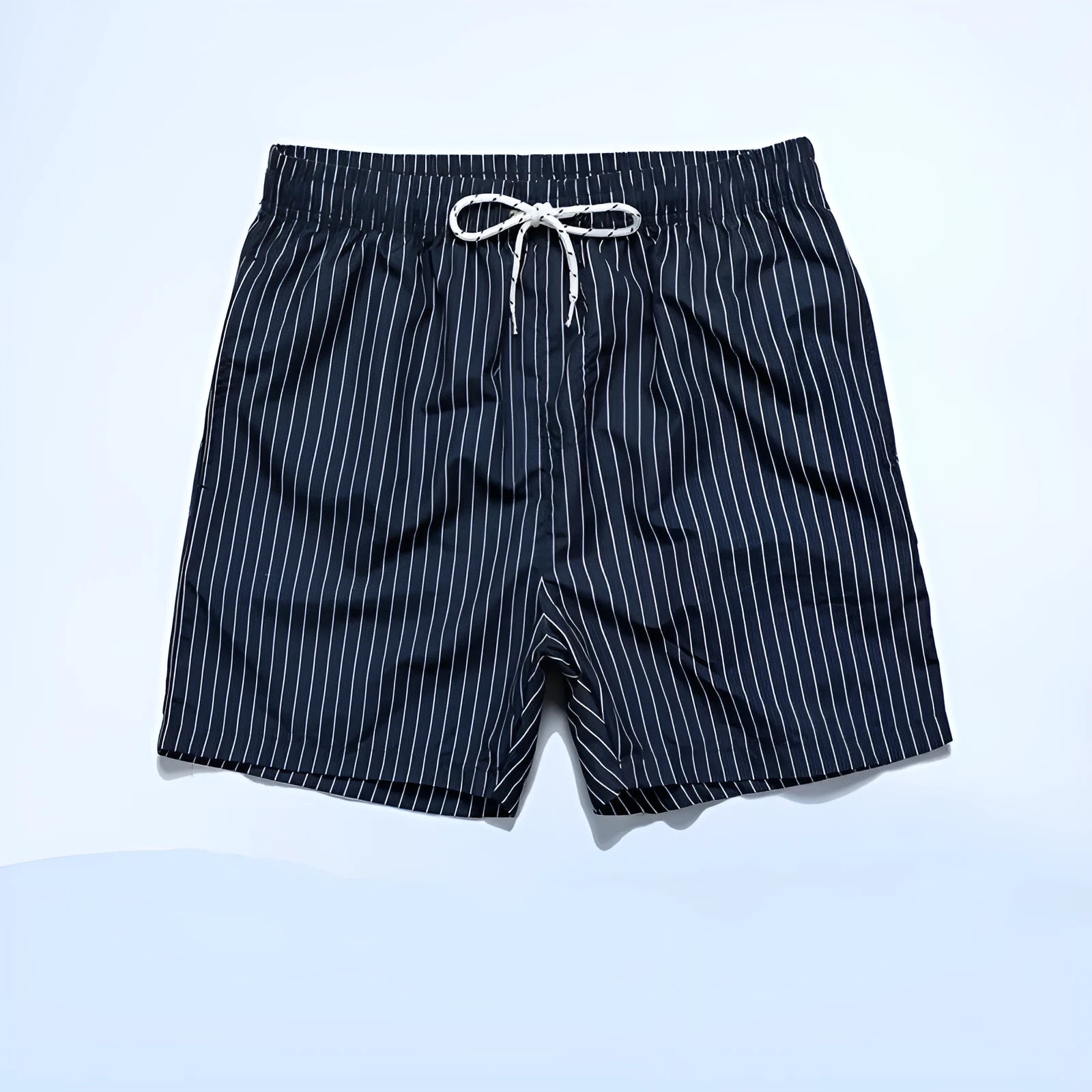 Navy blue striped beach shorts with straight legs on a mannequin.