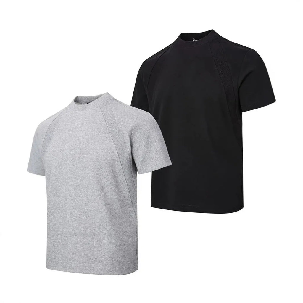 Black loose fit short sleeve top with air layer stitching detail on a hanger
