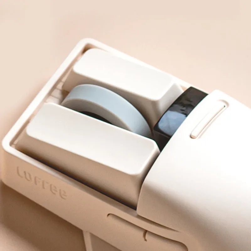 Tofu coloured wireless computer mouse with programmable buttons and scroll wheel on plain background
