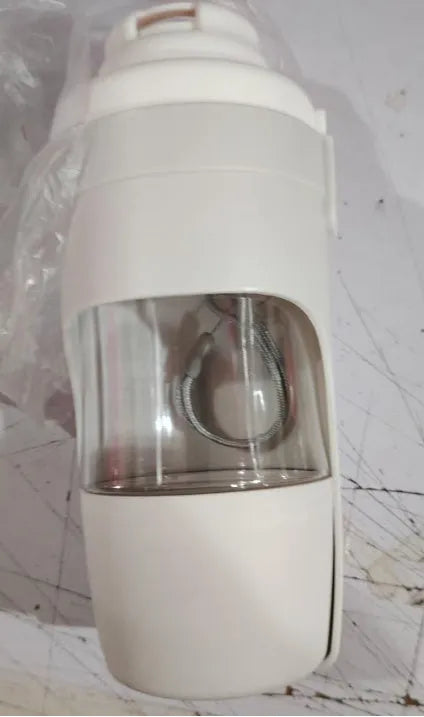 Green portable pet water bottle and food feeder with attached lanyard, showing transparent cup design.