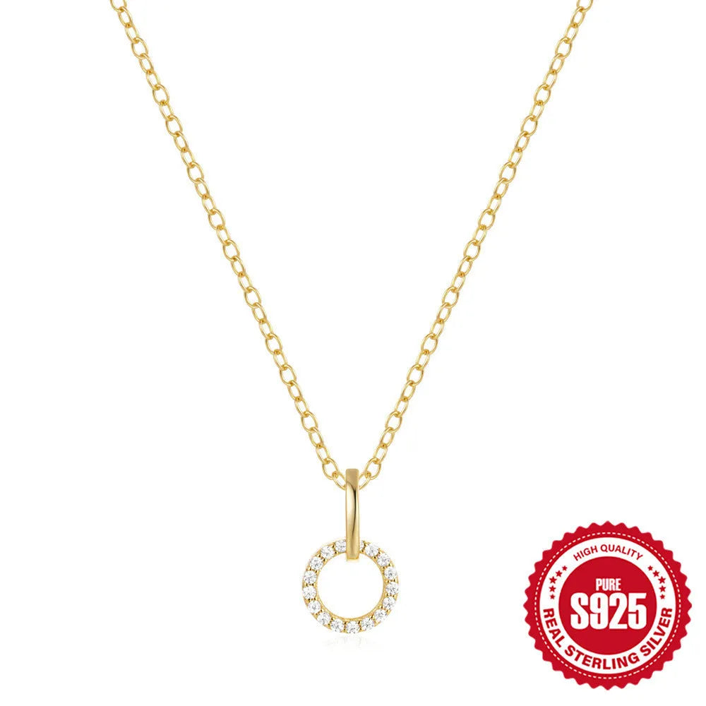 Gold-coloured S925 sterling silver geometric pendant necklace on a model, showing adjustable clasp.