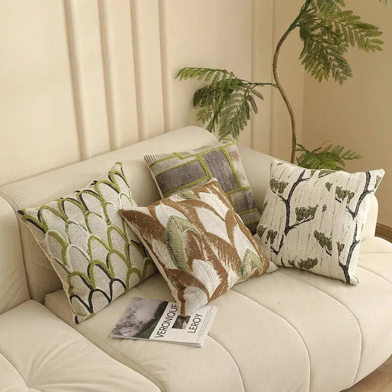Square jacquard woven pillow cover with detailed floral pattern in a choice of eight colours, 45x45 cm.