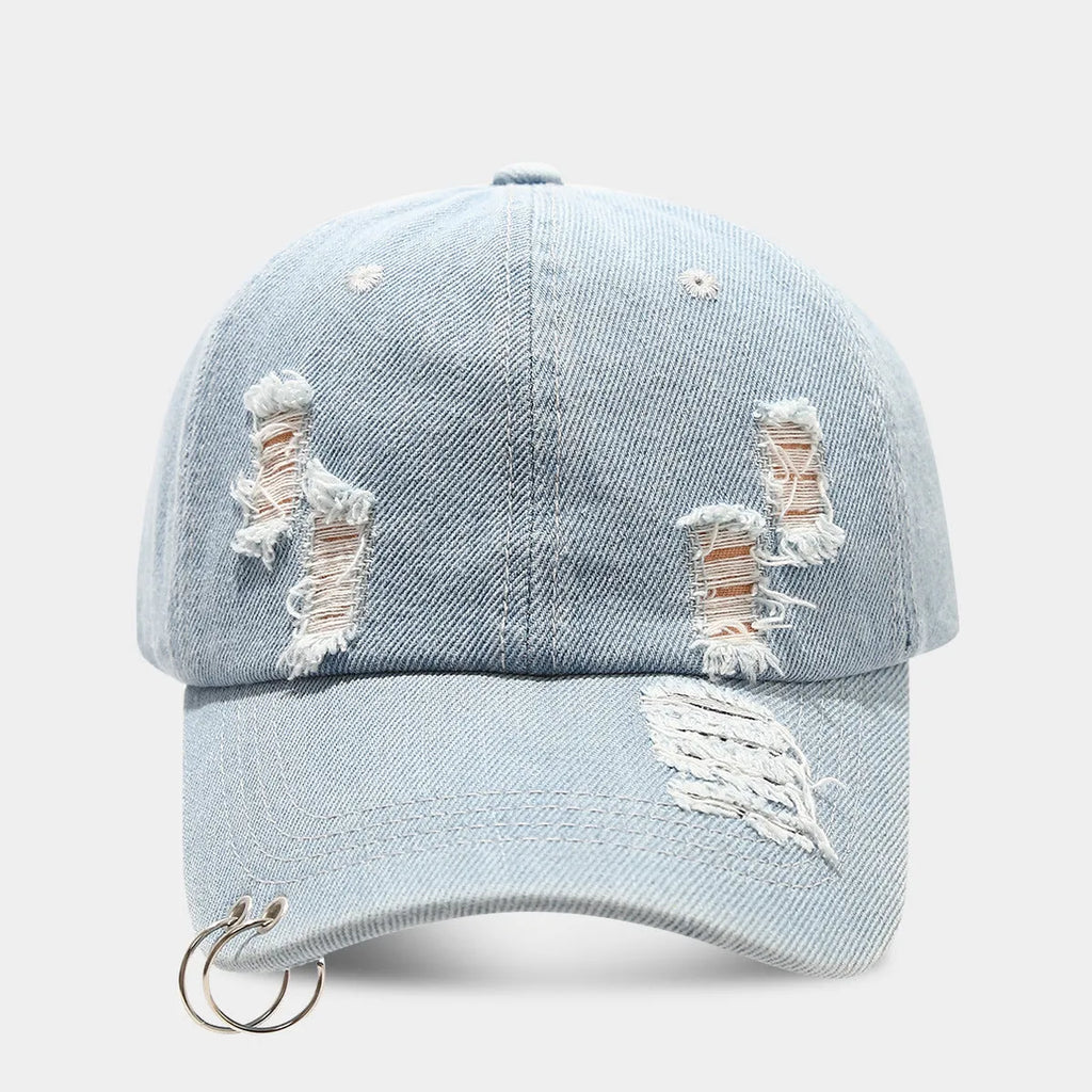 Men's black denim peaked cap with adjustable strap and dome crown on a plain background.