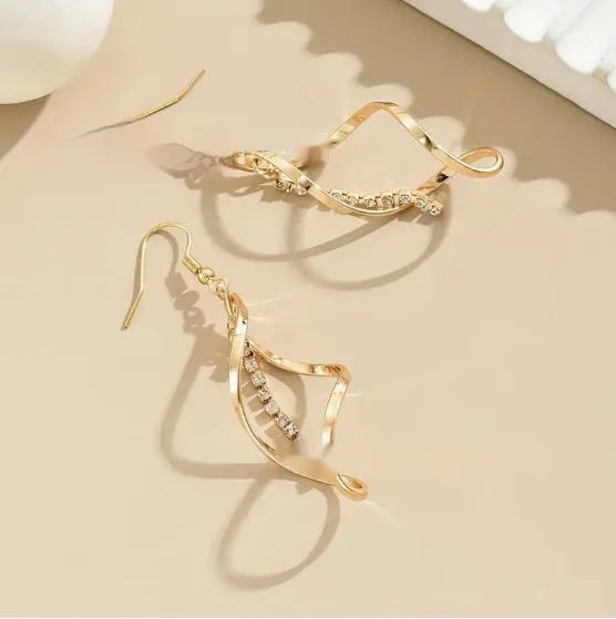Geometric spiral design gold electroplated alloy earrings with elliptical shape