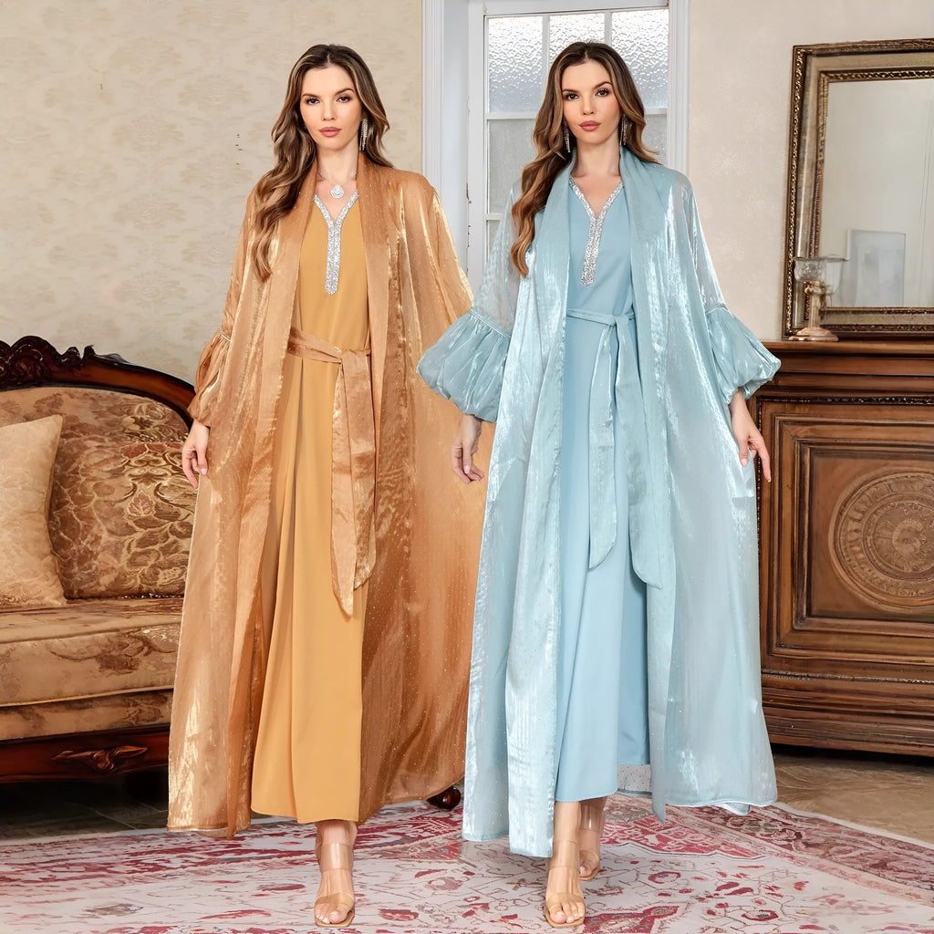 Arabic style two-piece set dress with rhinestone detailing in blue colour, showing long sleeves and long skirt