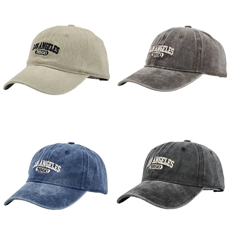 Retro distressed peaked cap with embroidered letters and adjustable strap in multiple colour options