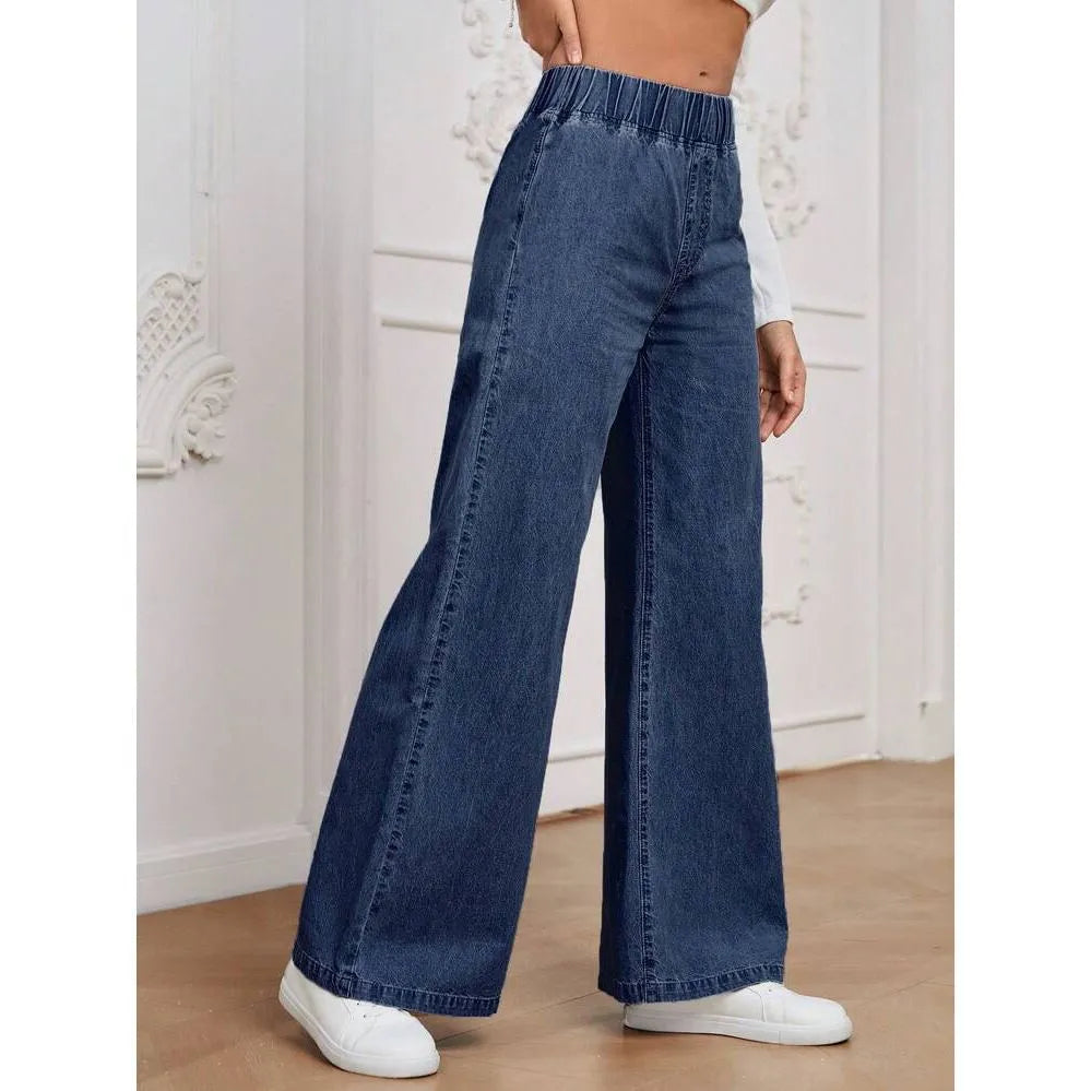 Plus size light blue washed straight leg jeans with wide fit and mid waist design