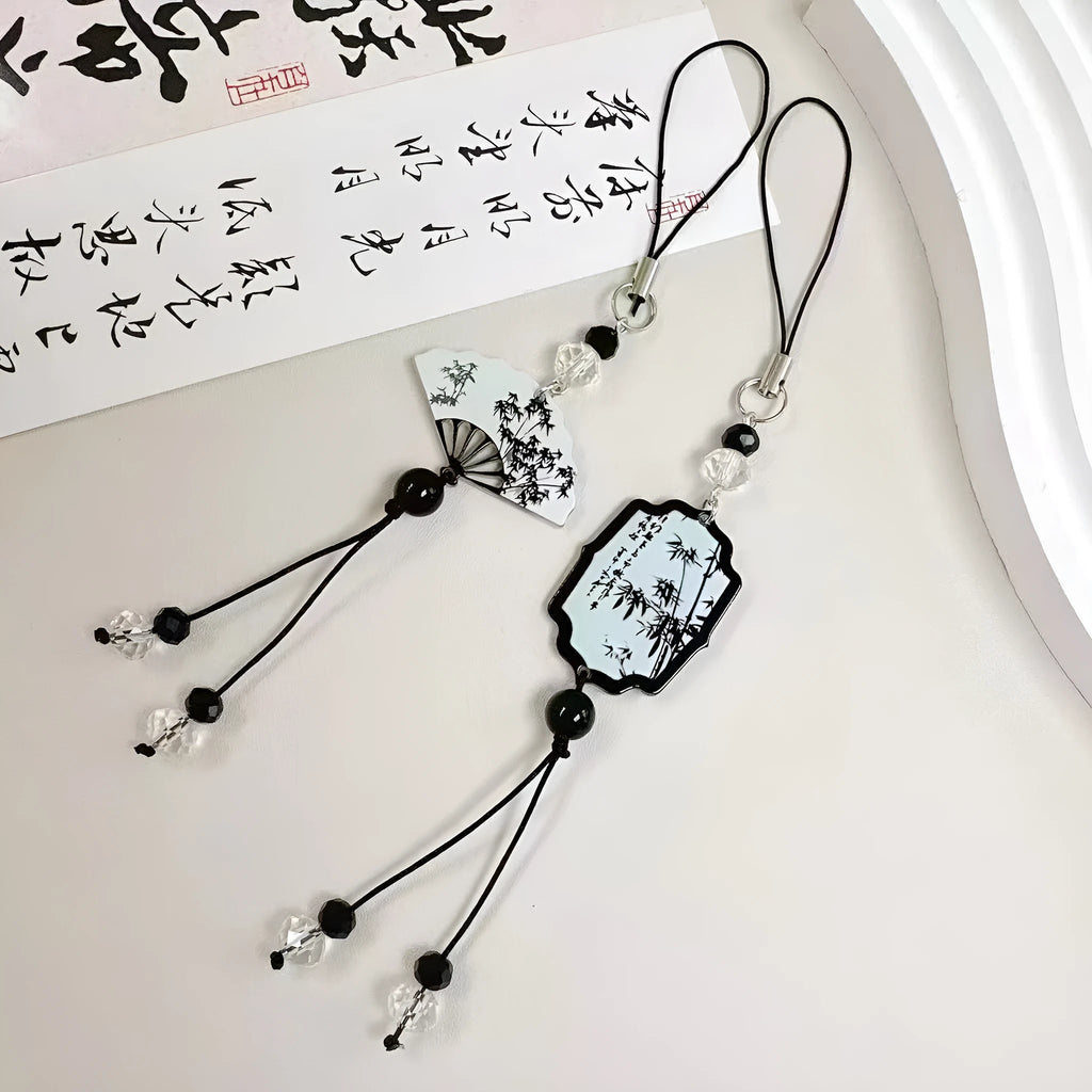 Guofeng Chinese style bead pendant keychain with detailed plant and flower pattern in a glossy finish.