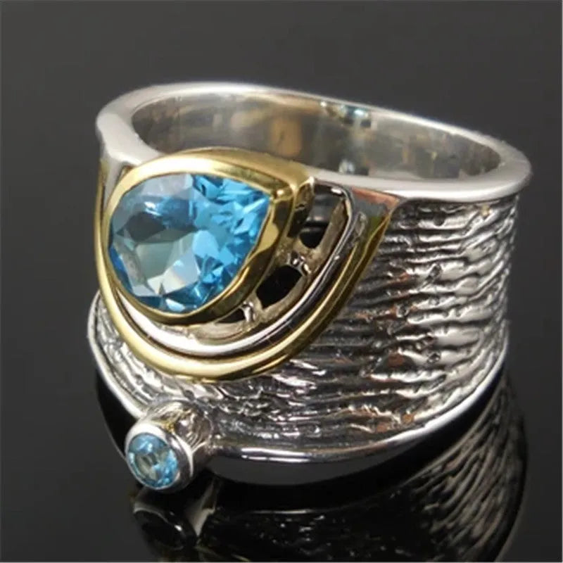 Blue Chinese style zircon ring with rhinestone detailing and drop shape on alloy band