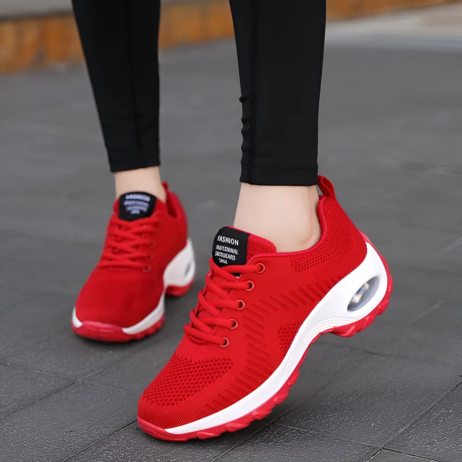 Women's round toe red mesh sneakers with white laces and a platform sole on a white background