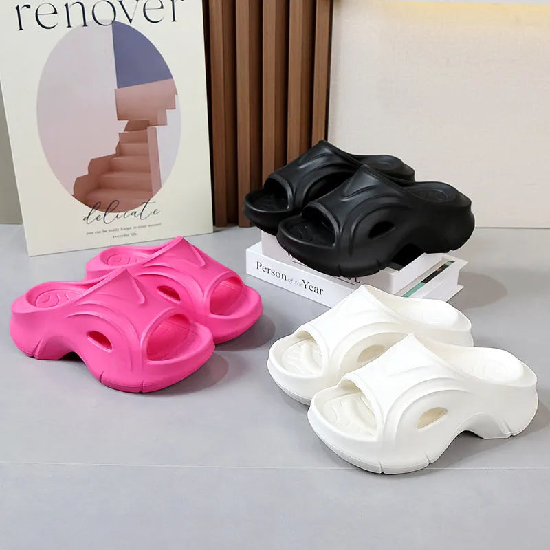 Women's EVA thick-soled slippers in white, black, and rose red colours with round toe design