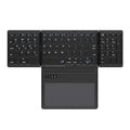 Black leather folding Bluetooth keyboard displayed against white background, folded and unfolded