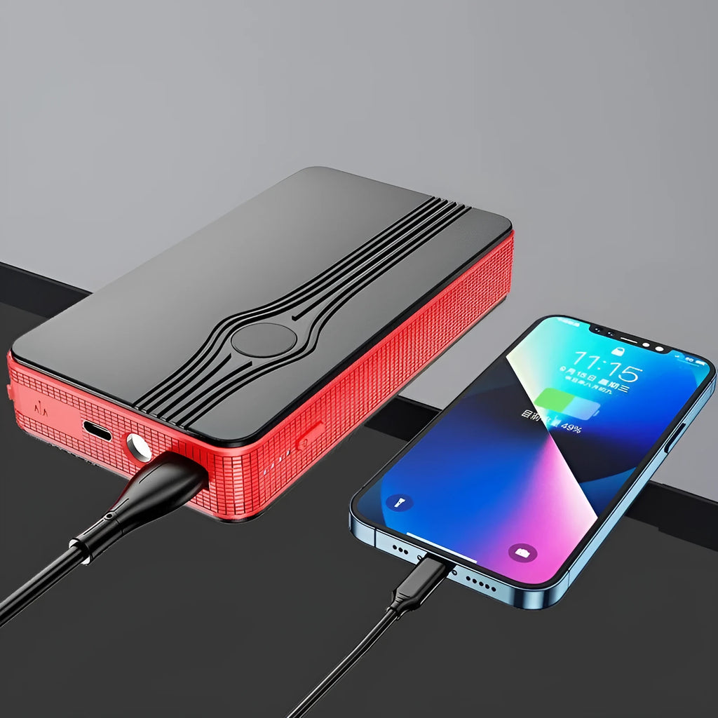 Red K4-E automobile emergency starting power supply and jump starter unit with data cable.
