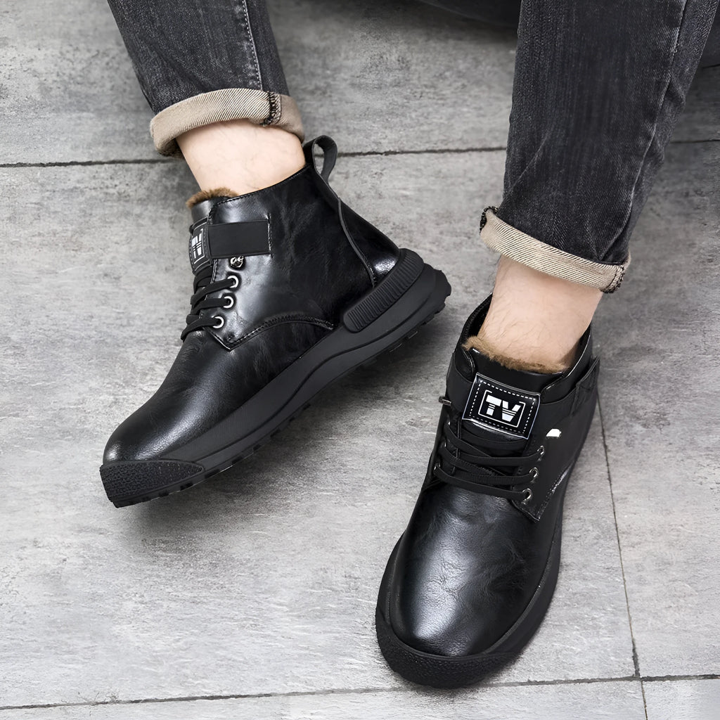 Black Martin high-top platform boots with artificial PU upper and rubber sole on a white background