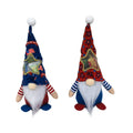 Two faceless baby doll Christmas ornaments with Rudolf and candy bag designs on polyester cloth