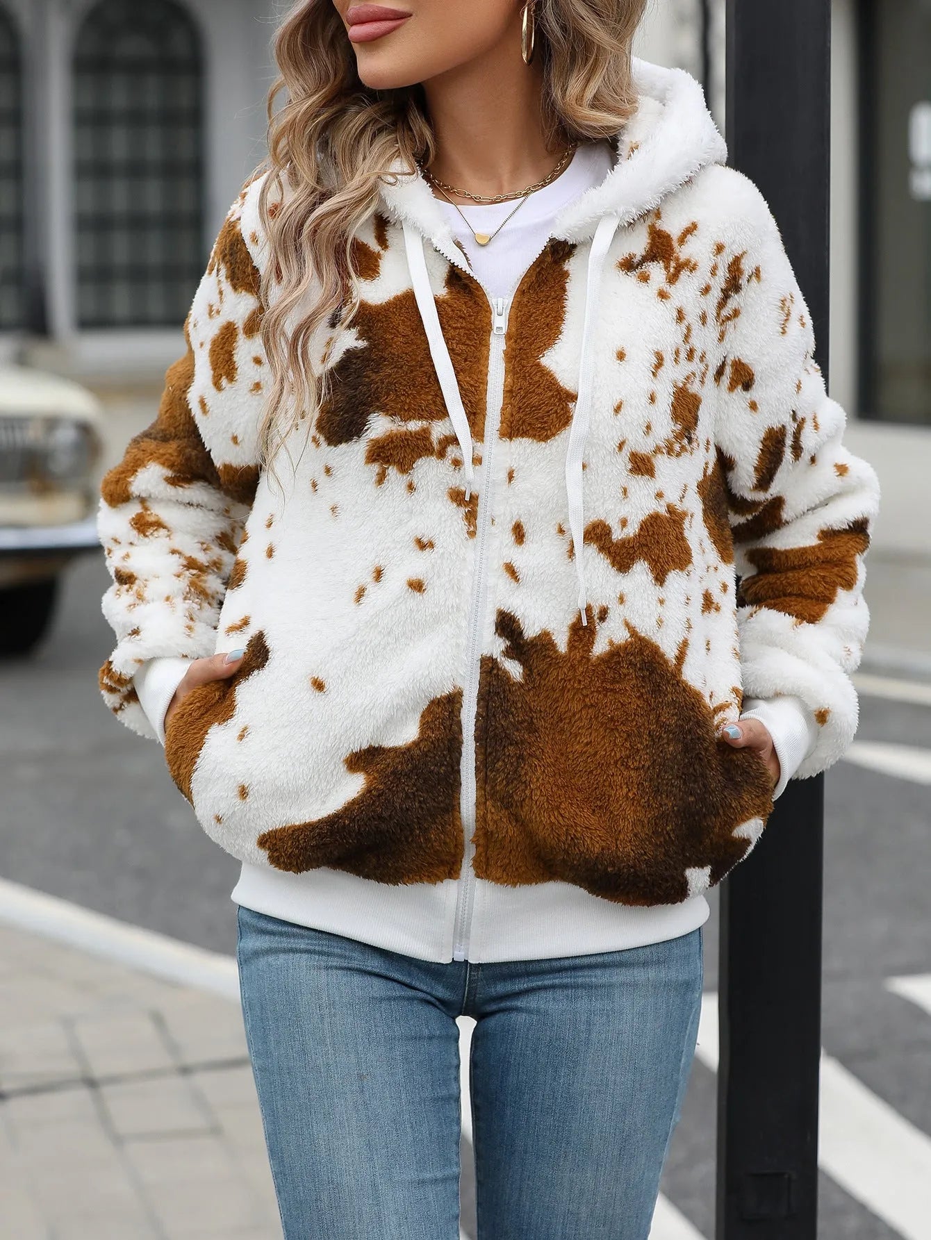Yellow brown cow print plush cardigan jacket with hood and front zip.