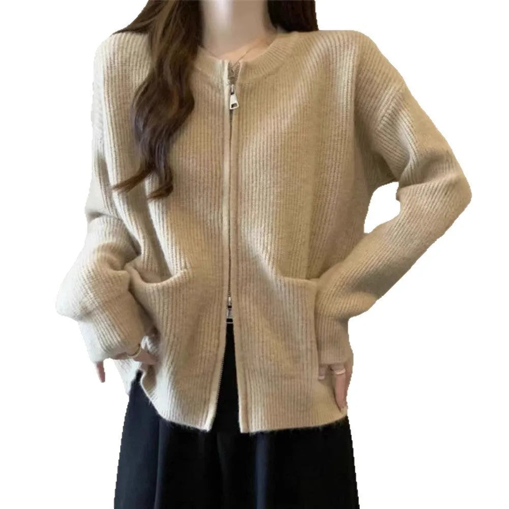 Beige women's soft viscose sweater coat cardigan with long sleeves on a hanger.