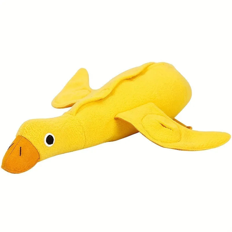 Yellow teddy dog training toy with integrated duck doll and food leak compartments