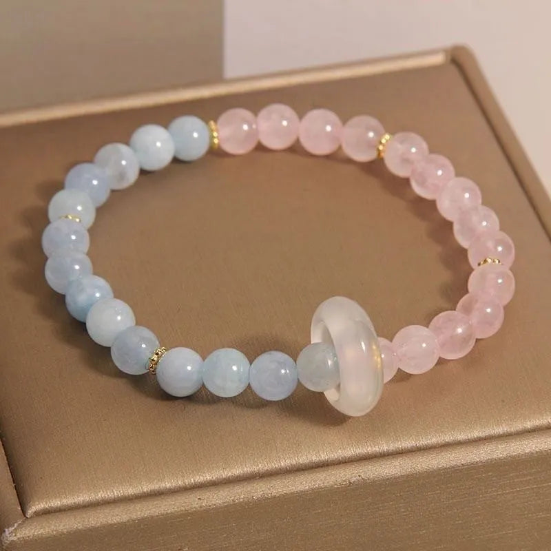 Women's aquamarine dopamine bracelet with pink blue beads and geometric round elements