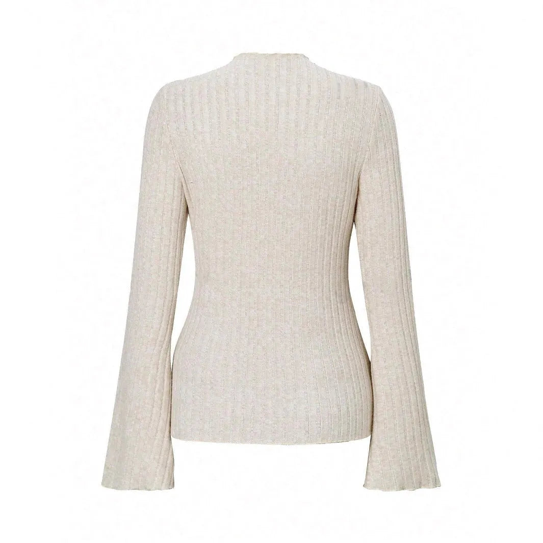 Black slim fit long sleeve top with lantern sleeves and a round neckline on a mannequin.