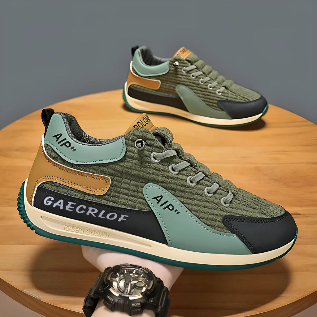 Men's green and grey mesh running shoes with round toe design and front lace-up closure