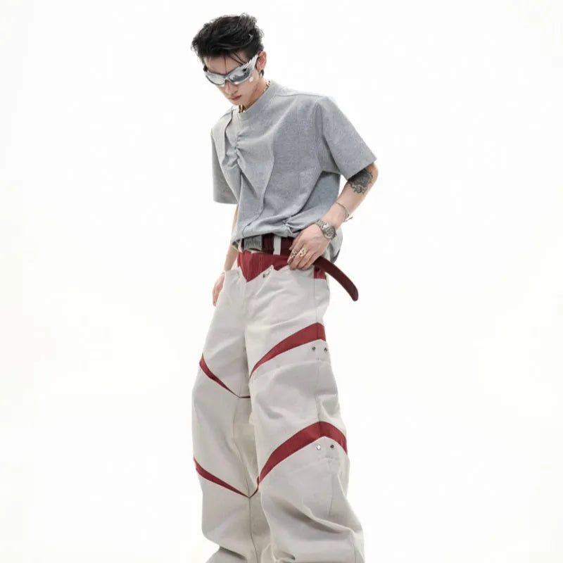 Men's loose fit grey cotton T-shirt with three-dimensional pleated detail on the front.