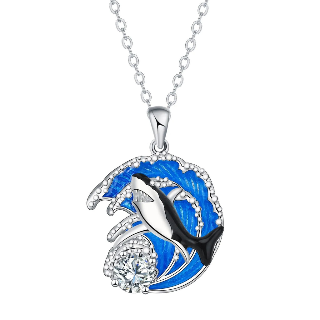 Silver shark pendant necklace on a cross chain, adjustable between 41cm and 50cm.