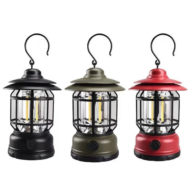 Dark green portable camping head lamp lantern with dimensions 16.6cm by 6.7cm by 9.6cm