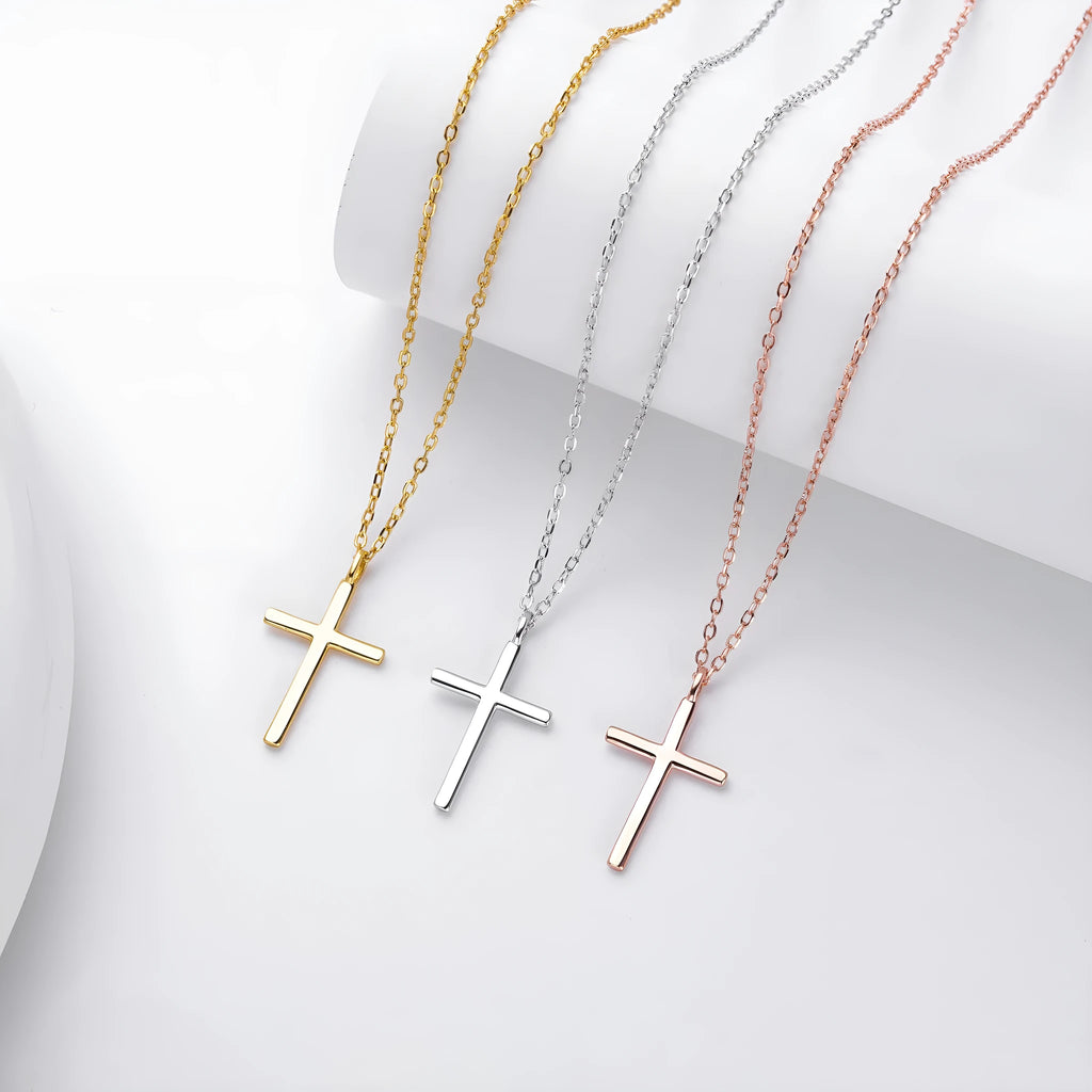 S925 sterling silver necklace with a simple glossy cross pendant on an adjustable O-shaped chain.