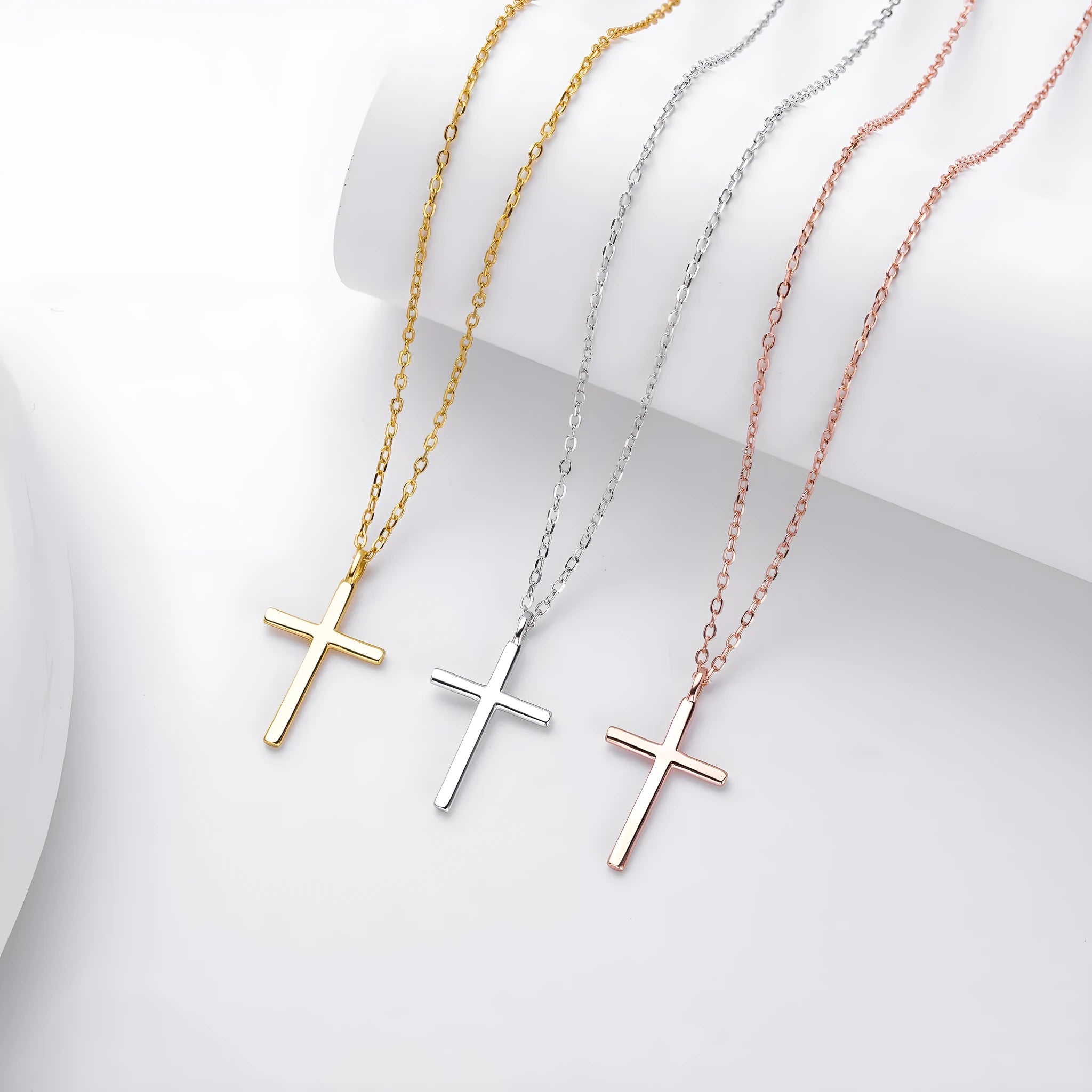 S925 sterling silver necklace with a simple glossy cross pendant on an adjustable O-shaped chain.