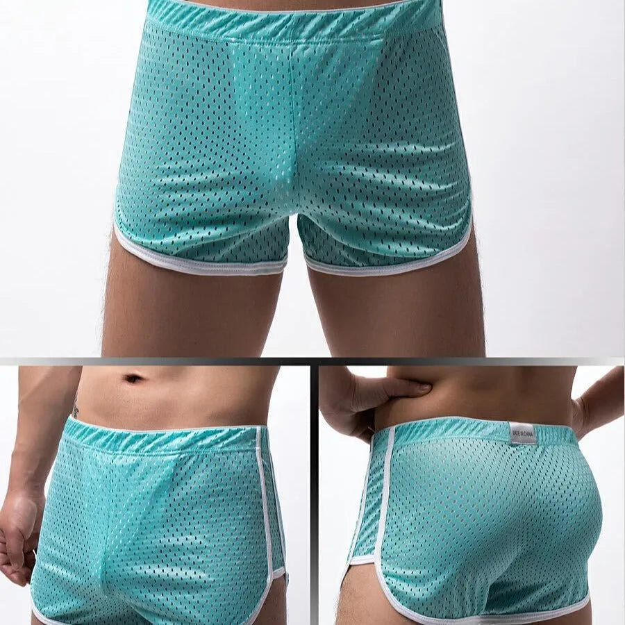 Men's grey cotton blend three-point boxer shorts laid flat, showing mid-waist design.