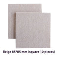 Assorted beige plastic chair leg stoppers in round and square shapes on a wooden floor.