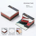 3D paper carving sticky notes with a raised Christmas Train design on the cover.