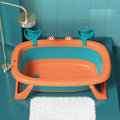 Foldable blue portable pet tub for bathing small cats and dogs at home