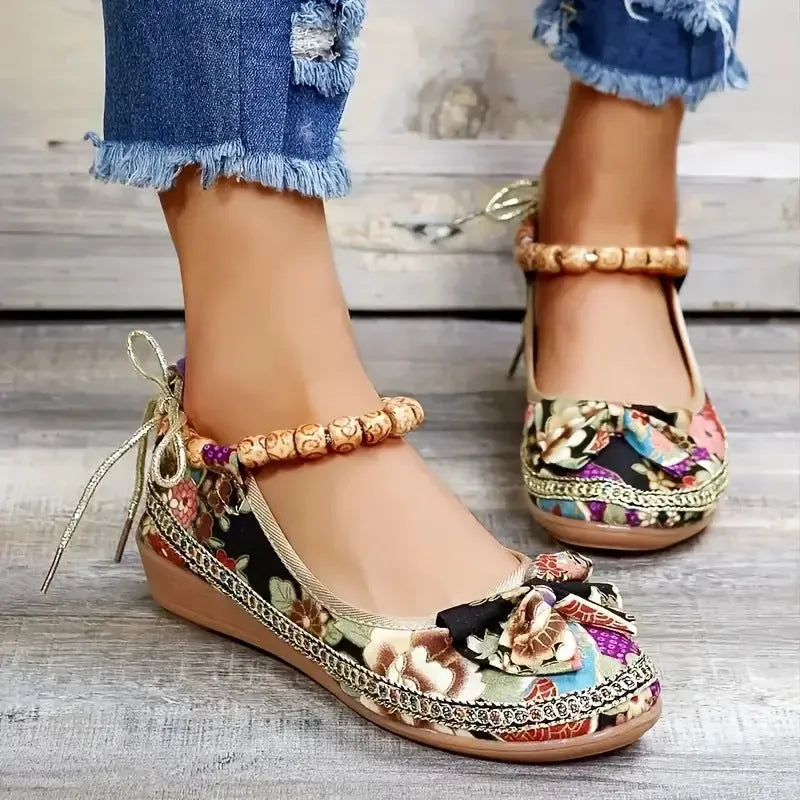 Women's plus size ethnic platform sandals with cloth upper, elastic band, and round toe in black or red