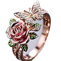 Adjustable butterfly personality ring with colourful oil drip finish showing floral and insect details