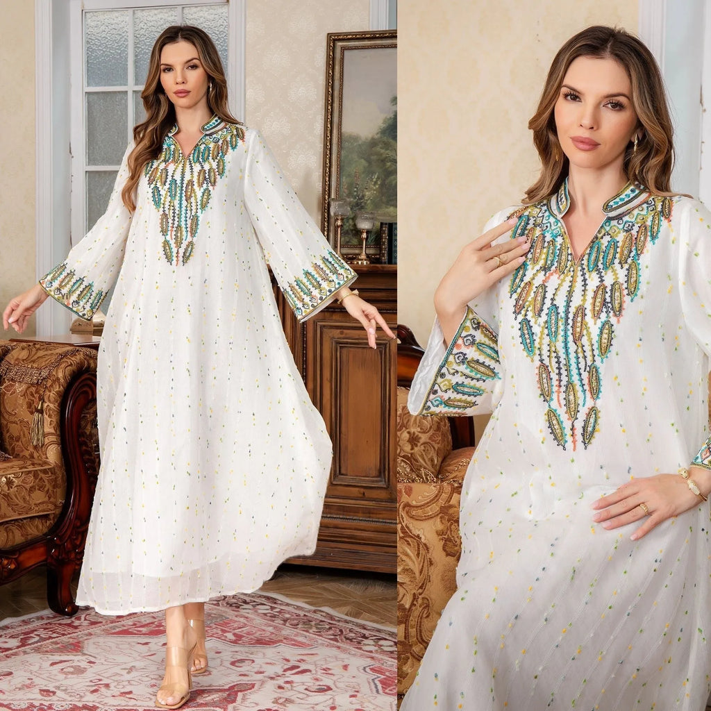White Dubai-style Arabic robe with long sleeves and full-length skirt for women