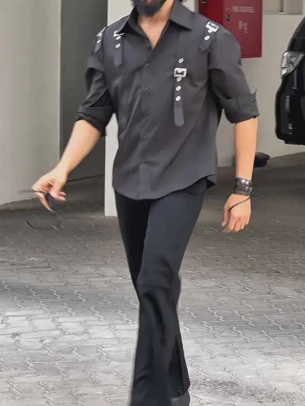 Men's black utility-style button-up shirt made from polyester fabric, showing regular fit.