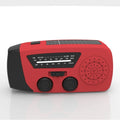 Red rechargeable emergency hand radio torch with built-in speaker and USB charging port