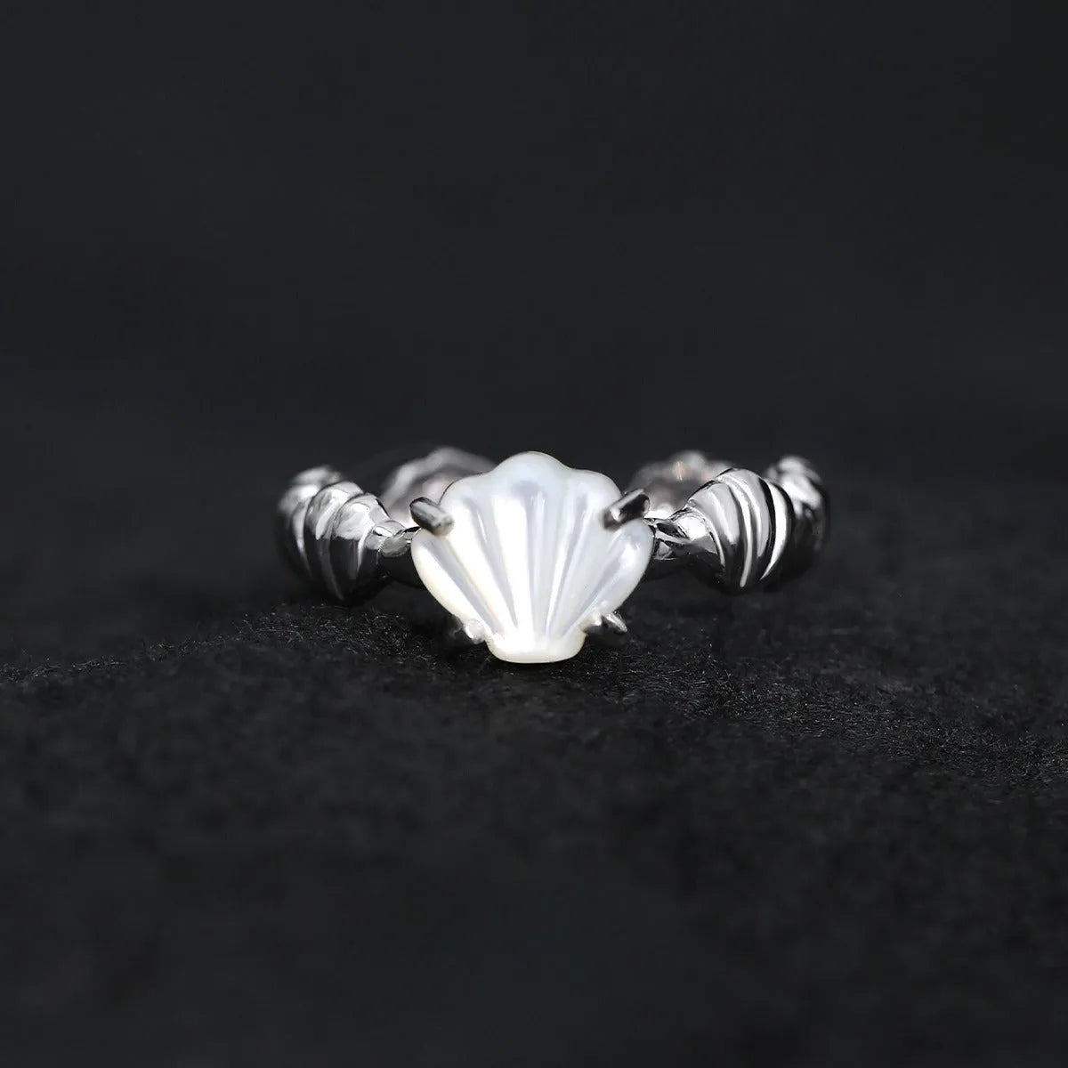 Adjustable silver ring with shell design and tiger eye stone in white gold plating