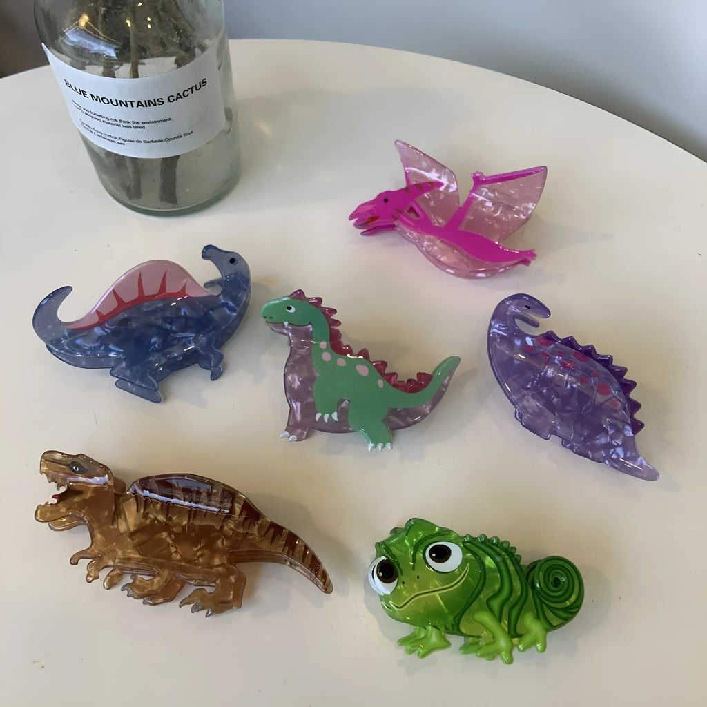 Acrylic dinosaur-themed hair clip with jaw grip design in one of six colour variations
