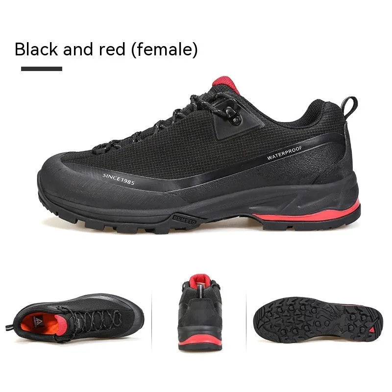 Men's low-top mountain climbing shoes in black with non-slip rubber soles and lace-up front closure