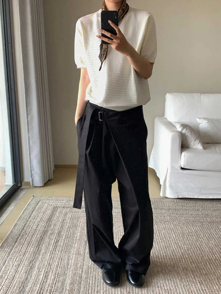 Black straight-leg trousers with a single pleat and adjustable waistband on a plain background.